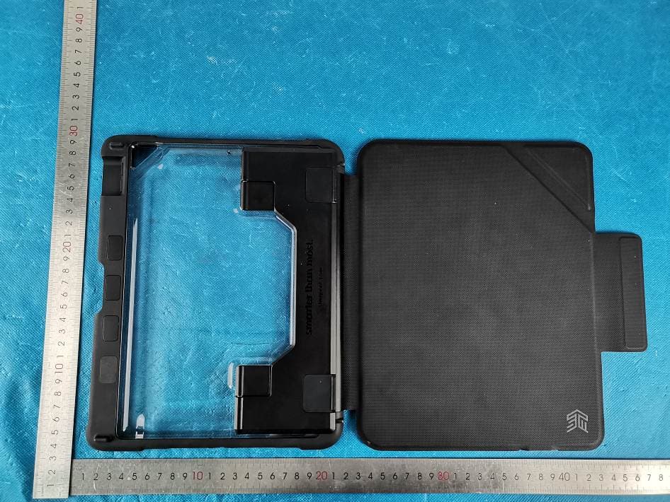 Dux Bluetooth Keyboard case - FCC ID 2AZL3-STM - Chun Lam Group (International) Limited