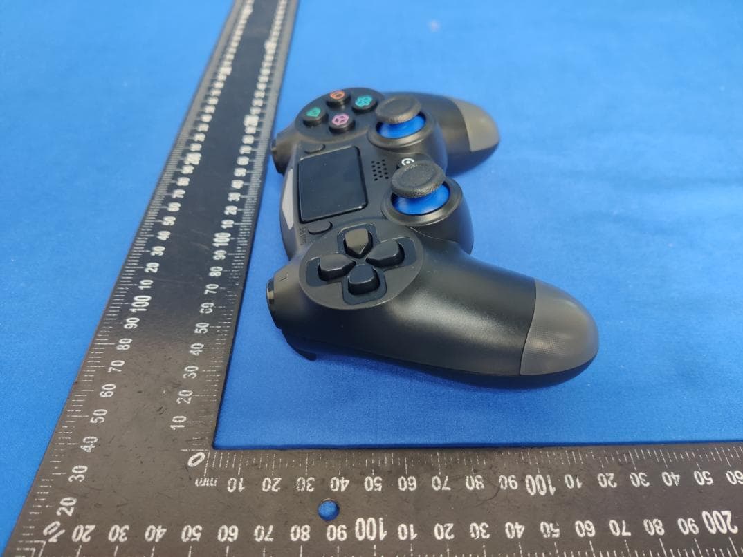 Wireless Game Controller for PS4 - FCC ID 2AZUP-SP4236 - Shenzhen CHT Technology Co., Ltd. (5)