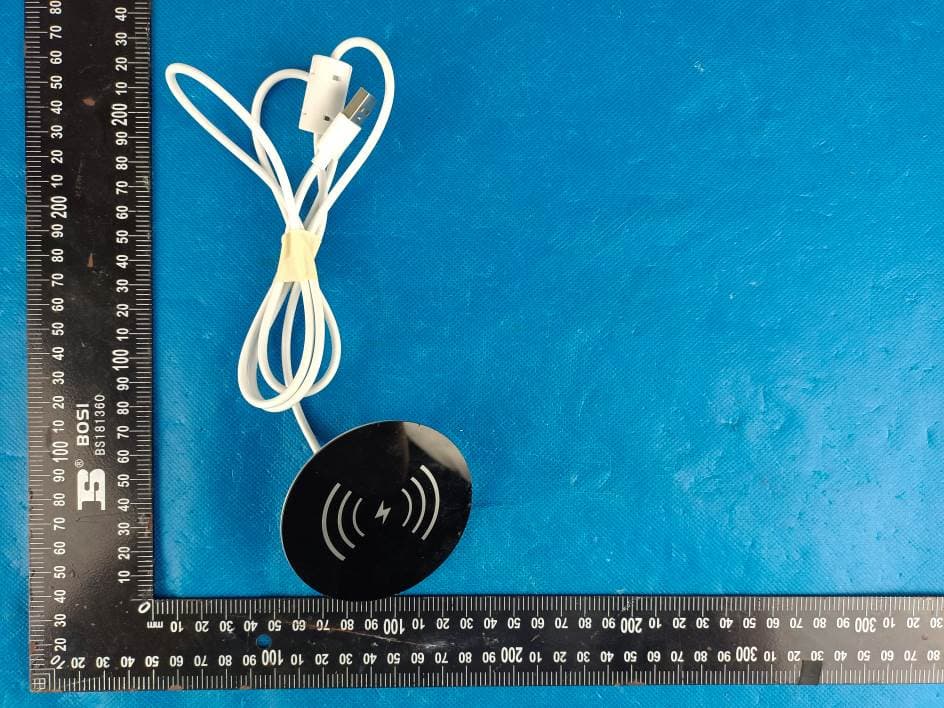 Wireless Charger - FCC ID 2AZX5-X-10 - Foshan Jindaming Technology Co., Ltd.