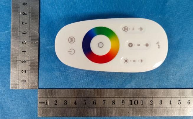 Wireless 8-key touch remote control - FCC ID 2BAPV-ER1818A - Eran Financial Services LLC