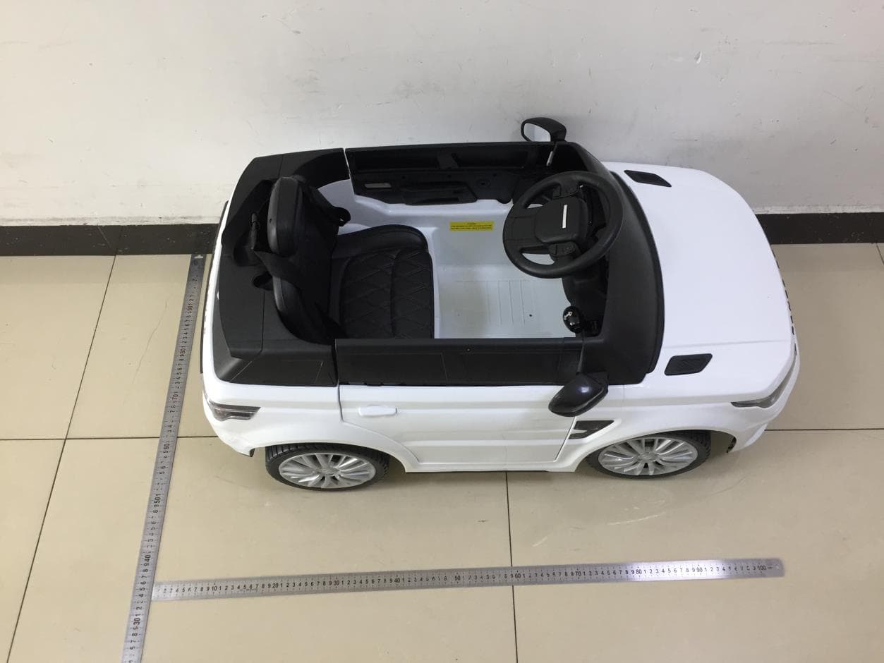 Range Rover 12V -WhiteMan - FCC ID 2BBCPCLB6732 - BRC Toys LLC DBA Best Ride On Cars (4)