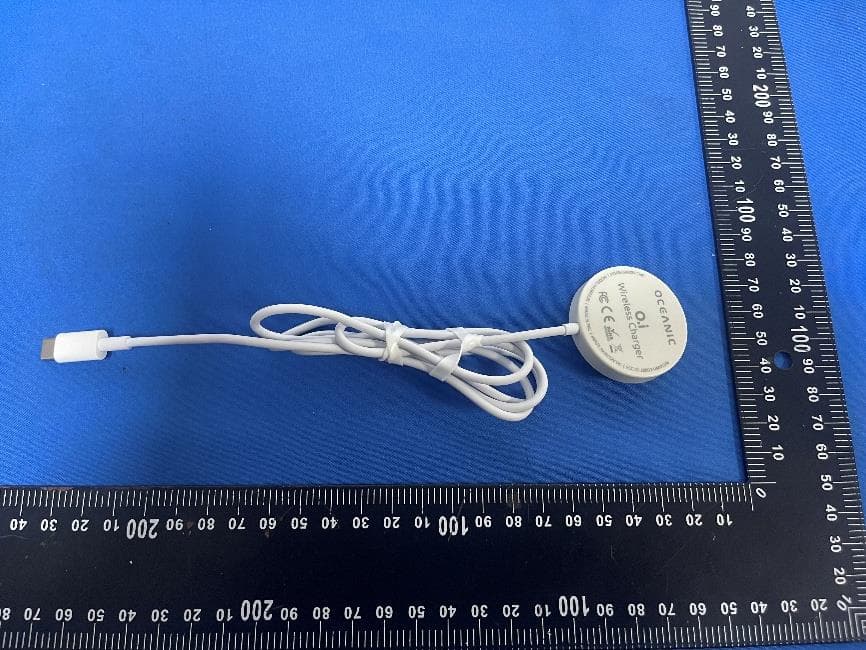 O.i Wireless Charger - FCC ID 2BBD2-04895306 - Huish Outdoors LLC. (2)