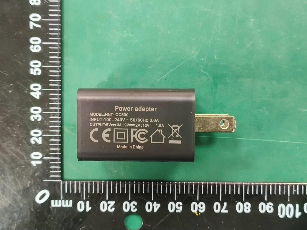 Wireless Charger - FCC ID 2BBMP-D302 - Dongguan Electric Xiao Er Electronic Technology Co.,LTD (3)