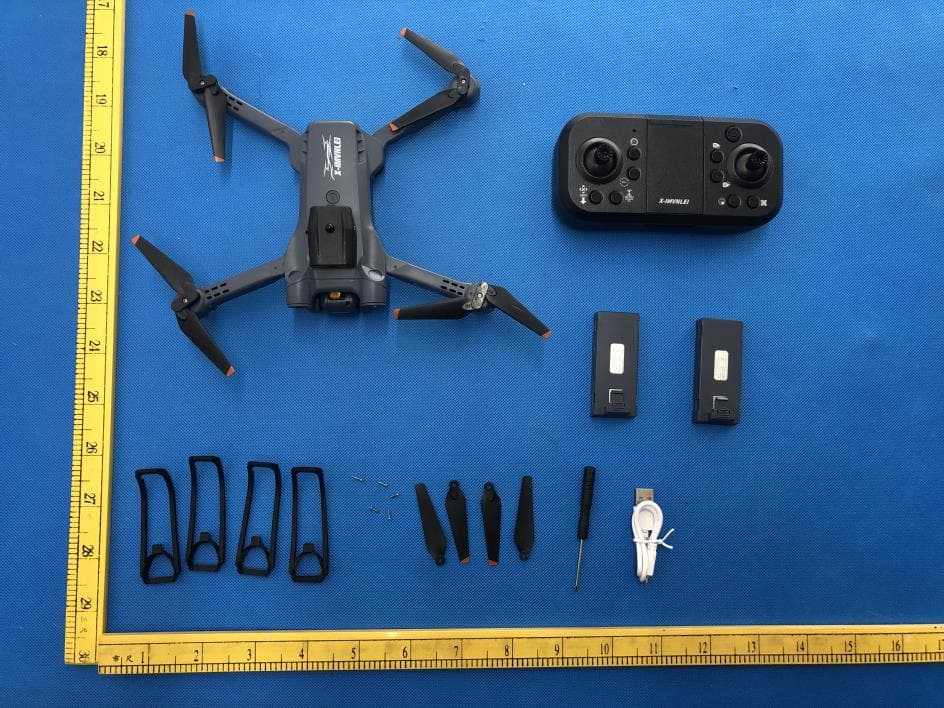 Quadcopter - FCC ID 2BBRTX-IMVNLEI - Guangzhou Yinan Trading Co., Ltd.