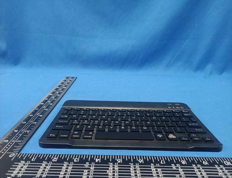 Bluetooth leather case keyboard - FCC ID 2BCB5-030 - SHENZHEN SENYUANXIANG TECHNOLOGY CO., LTD (4)