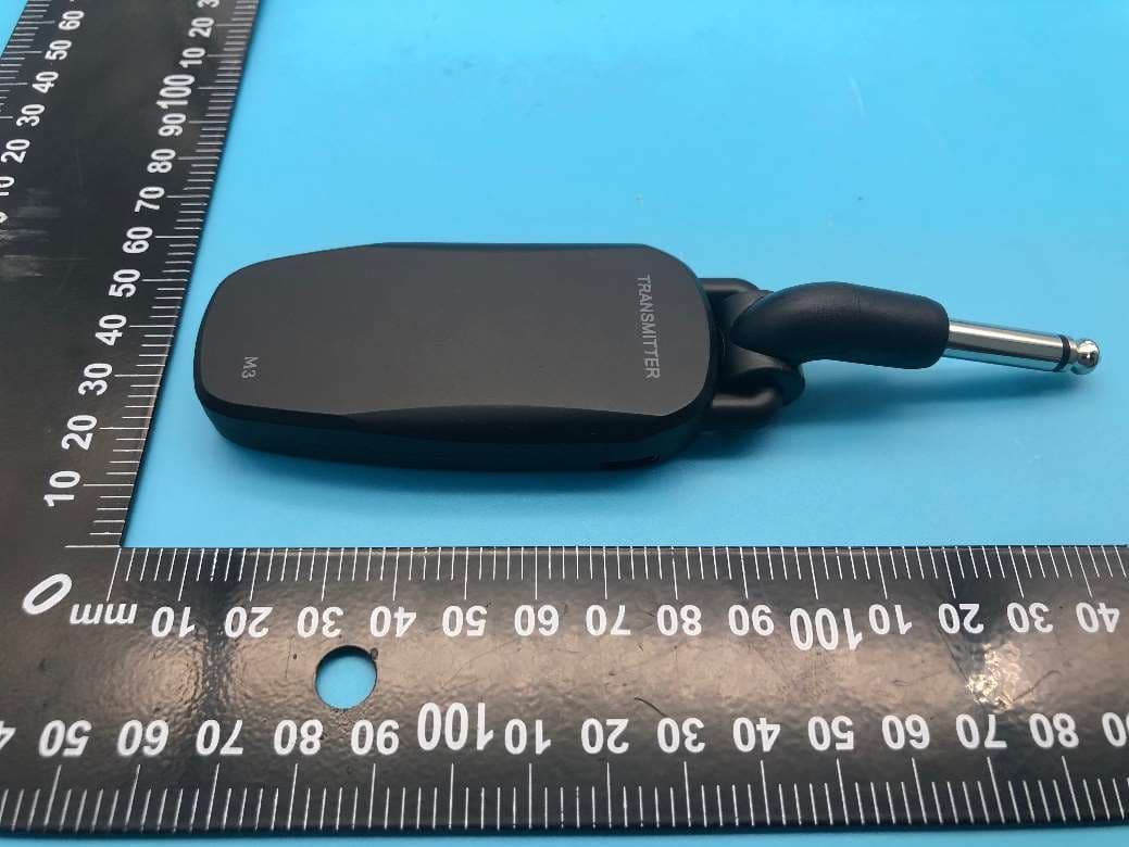 Wireless guitar system - FCC ID 2BCLB-M3 - Shenzhen Wonderful Music Equipment Co. , Ltd.