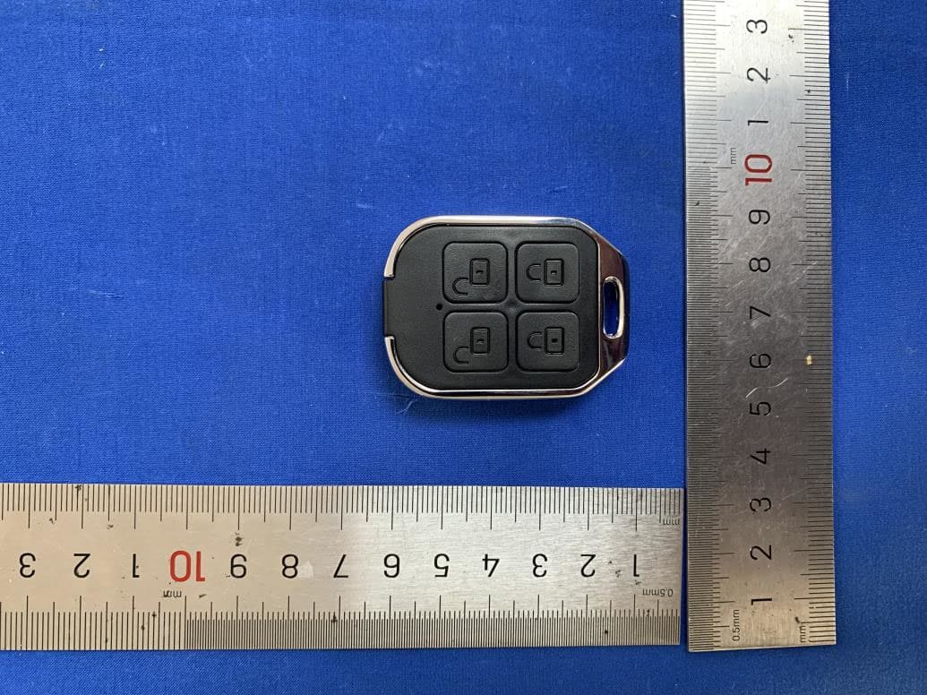4 BUTTON KEY FOB - FCC ID 2BDX6-R009V - RVLOCK & CO, LLC