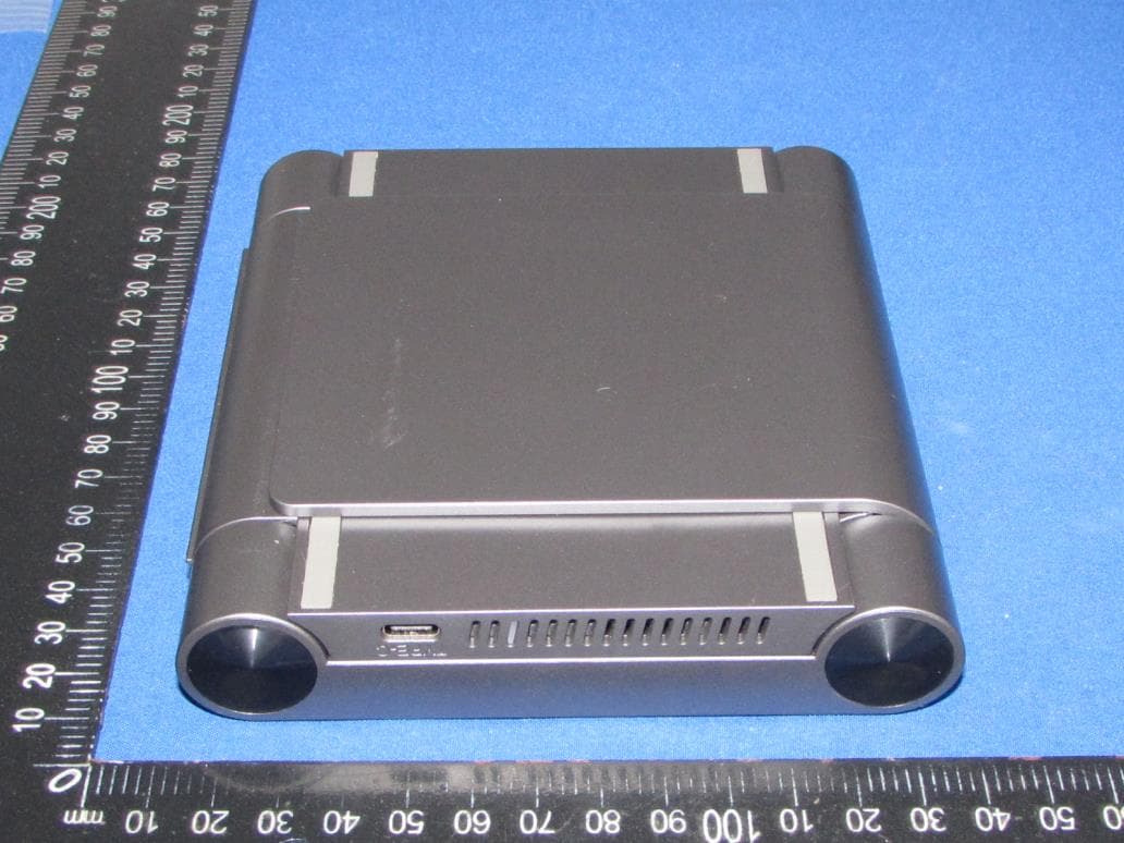 Foldable Wireless Charger Alarm Clock - FCC ID 2BG4HJY-01 - Shenzhen Jiuyang Technology Co., Ltd (3)