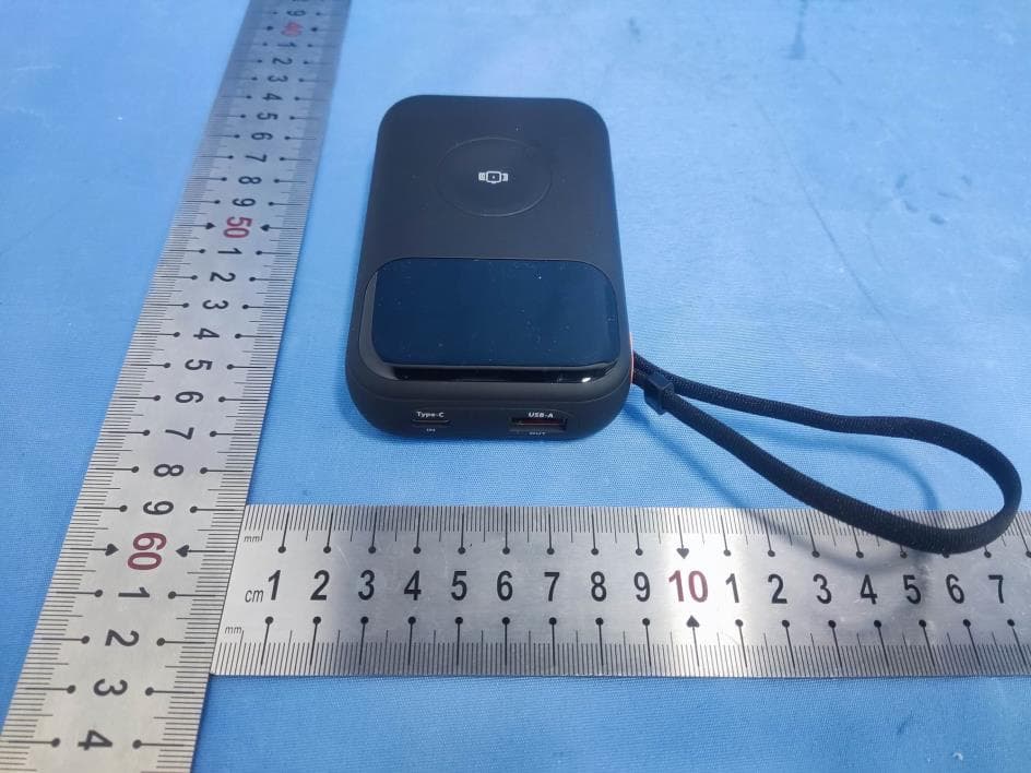 Power Bank mit Kabeln - FCC ID 2BGYR-TQ-PB07A - Shenzhen Toocki Network Technology Co., Ltd. (2)