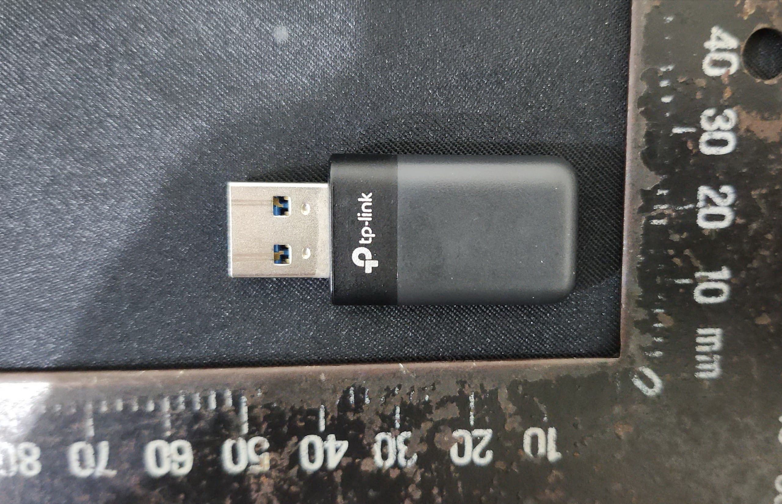 AX3000 Dual Band Wi-Fi 6 Wireless USB Adapter - FCC ID 2BH7FTX50U - TP-Link Systems Inc.