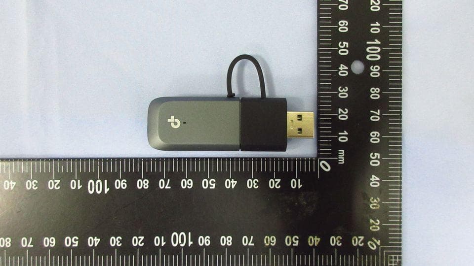 AXE5400 Tri-Band Wi-Fi 6E Mini Wireless USB Adapter - FCC ID 2BH7FTXE70U - TP-Link Systems Inc.