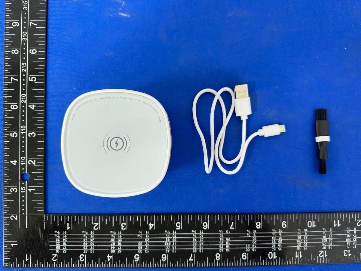 Desktop vacuum cleaner with wireless charging - FCC ID 2BHV7LP-066X - Ningbo Henglang Import and Export Co., Ltd (2)