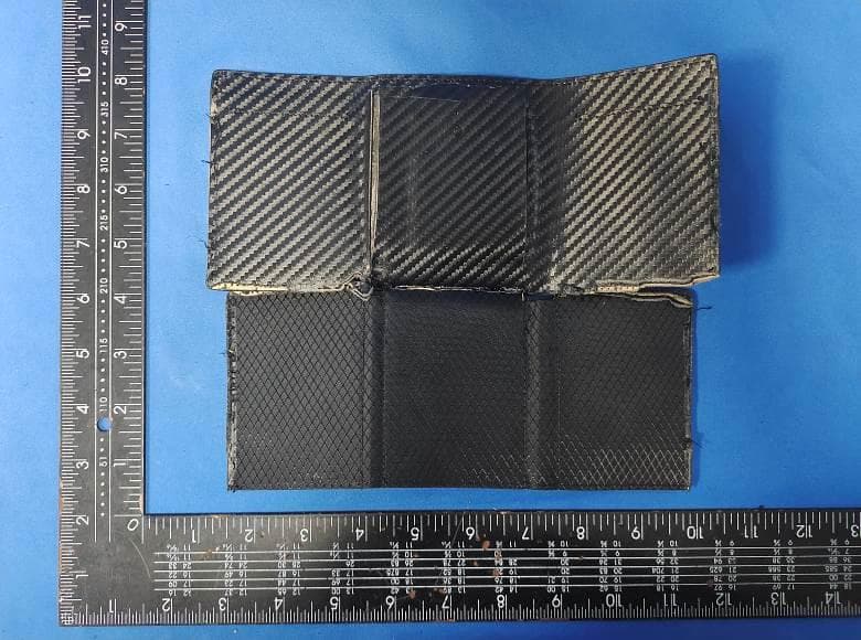 Find My Tracker - FCC ID 2BHWU-KP01 - Dongguan Weimei Clothing and Apparel Co., Ltd. (5)