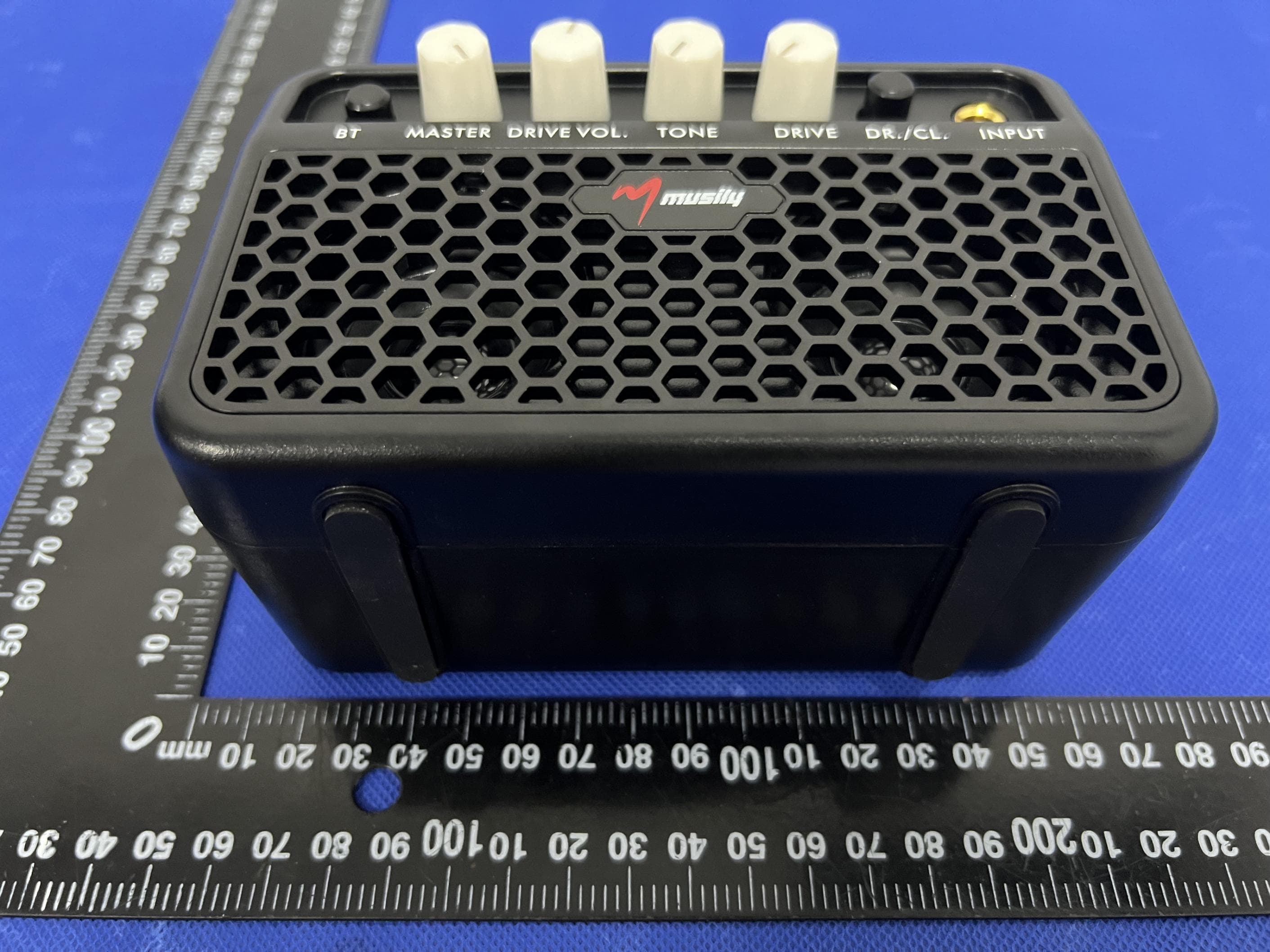 Mini Guitar AMP - FCC ID 2BLBT-MG-01 - Weifang MengQiXuanLv Trading Co., Ltd. (3)