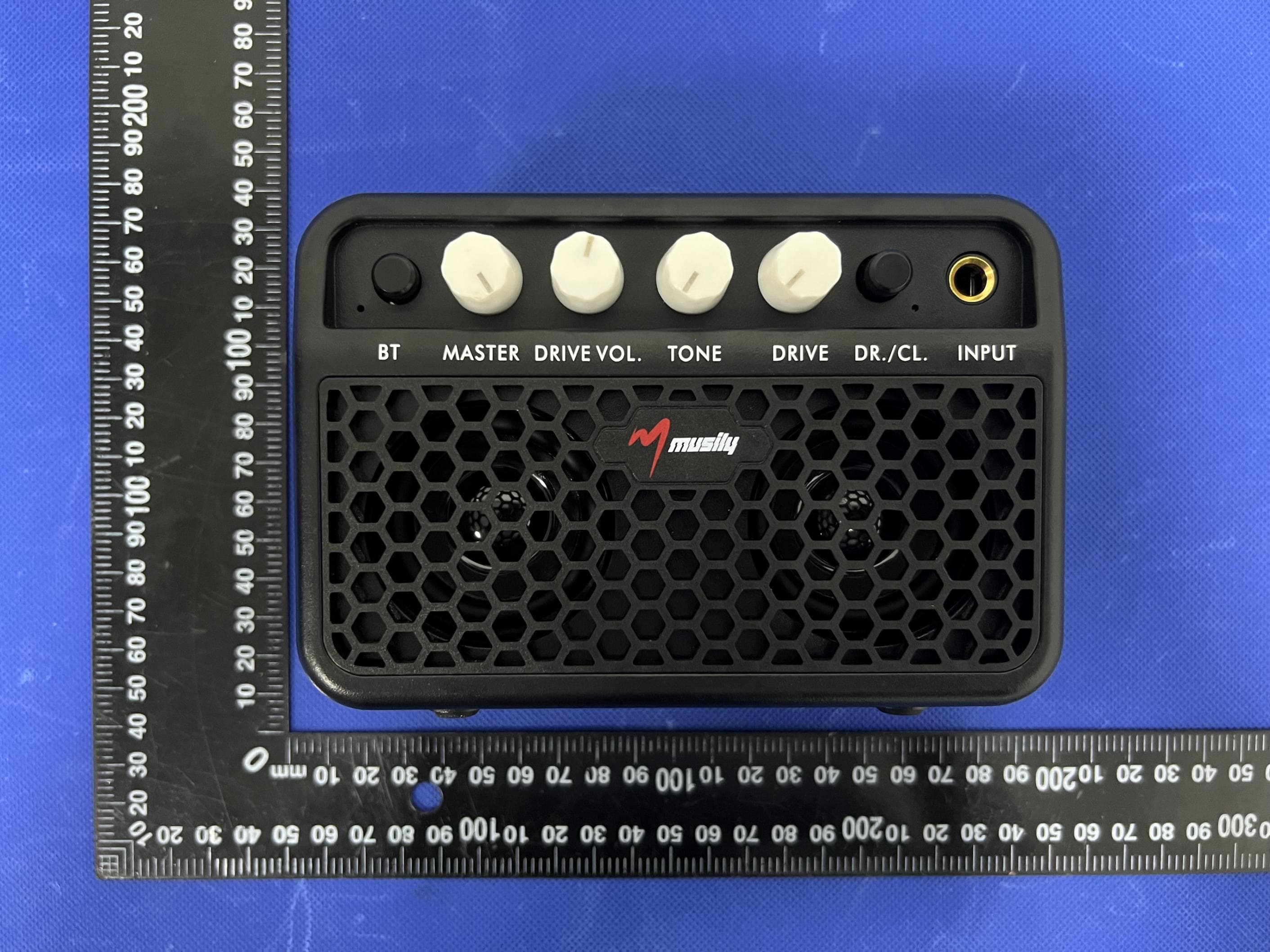 Mini Guitar AMP - FCC ID 2BLBT-MG-01 - Weifang MengQiXuanLv Trading Co., Ltd. (2)