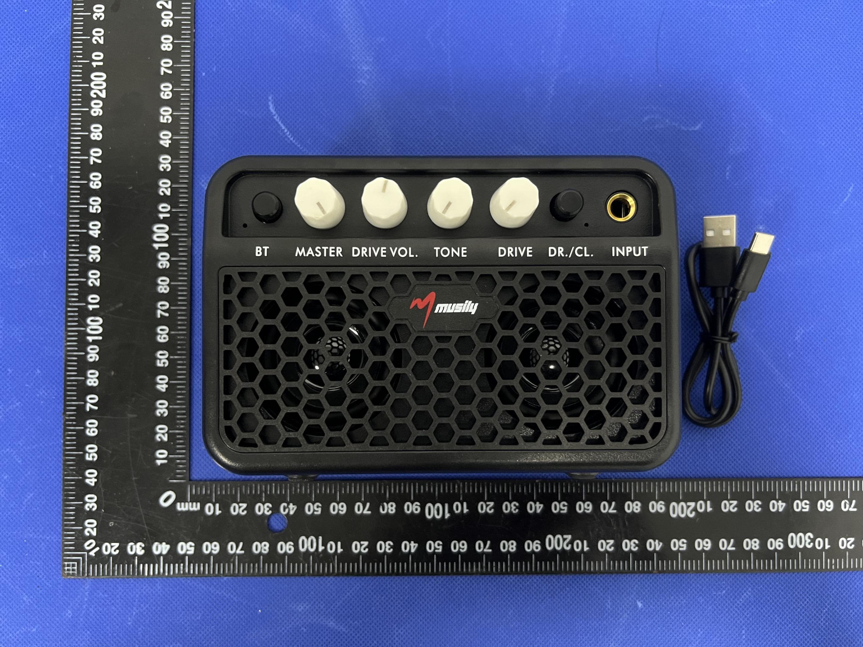 Mini Guitar AMP - FCC ID 2BLBT-MG-01 - Weifang MengQiXuanLv Trading Co., Ltd.