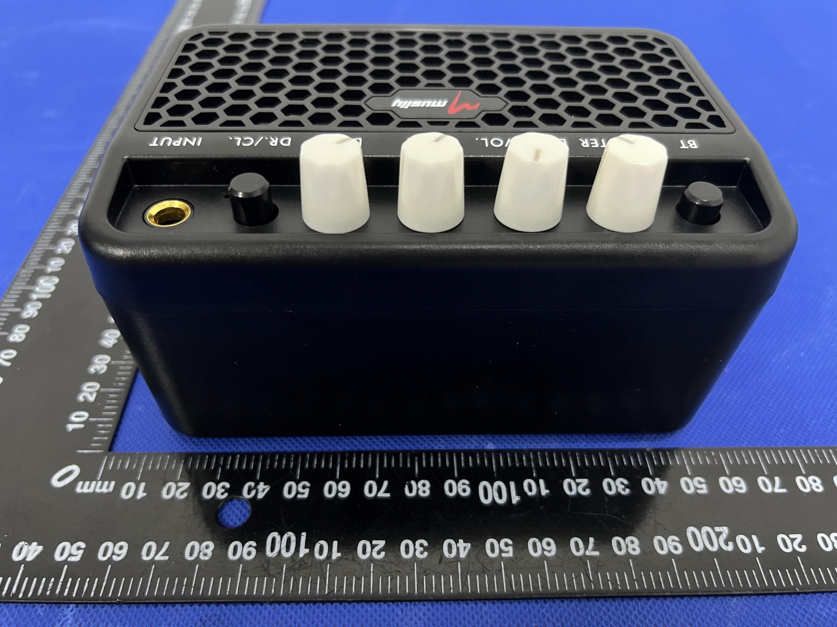 Mini Guitar AMP - FCC ID 2BLBT-MG-01 - Weifang MengQiXuanLv Trading Co., Ltd. (4)