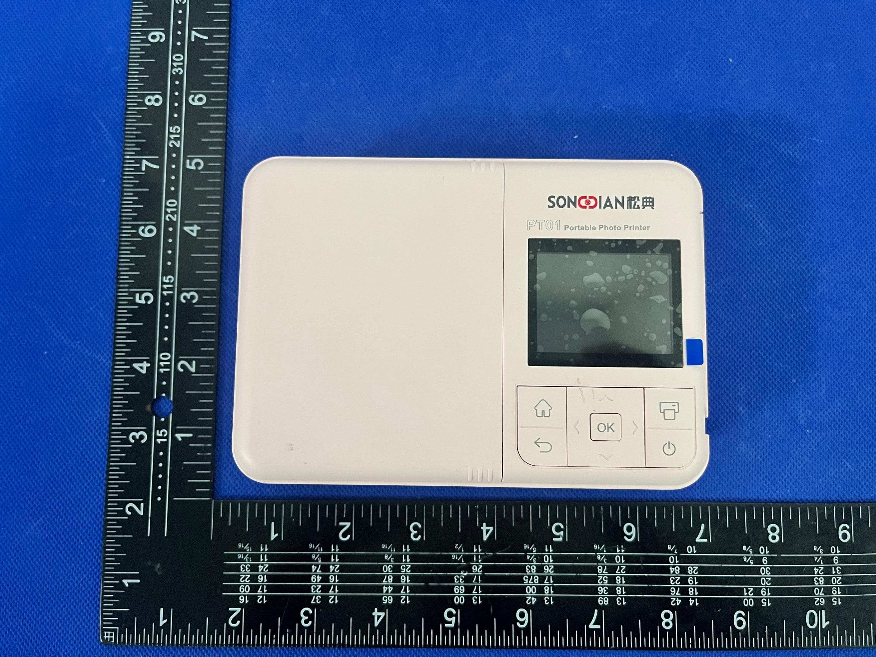 Portable photo printer - FCC ID 2BNYY-PT01 - SONGDIAN TECHNOLOGY(GUANGDONG)CO., LTD.