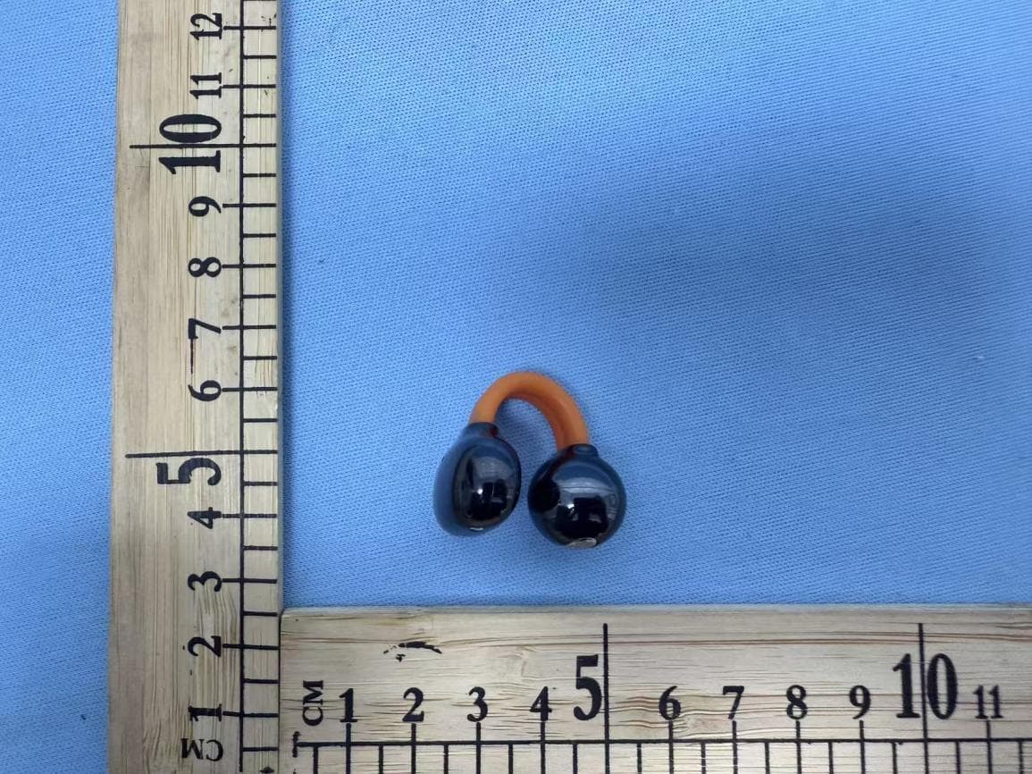 Lighting Earbuds - FCC ID 2BQSI-A9 - Yiwu Feilang Import and Export Co., Ltd. (2)