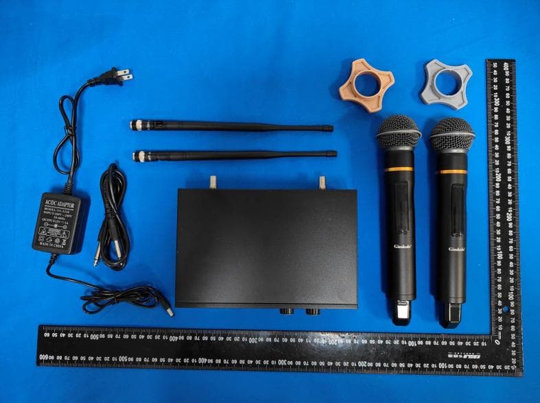 wireless microphone - FCC ID 2BSIO-TUC-702 - Enping City Chiyang Quansheng Technology Co., Ltd.