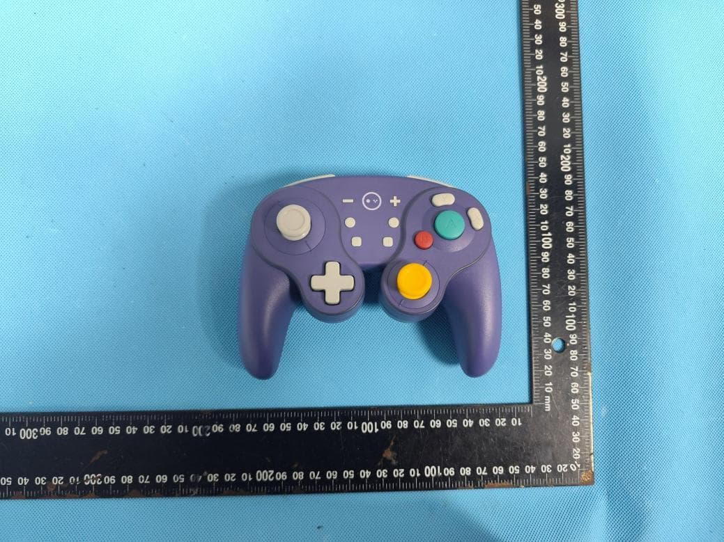 Wireless Joypad Controller - FCC ID 2BSWF-KS62 - Shenzhenshi Yingzhixing Technology Co., Ltd (2)