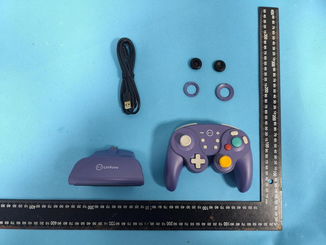 Wireless Joypad Controller - FCC ID 2BSWF-KS62 - Shenzhenshi Yingzhixing Technology Co., Ltd