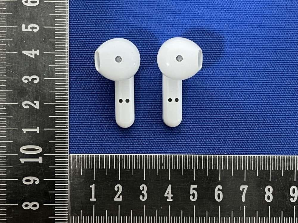 Wireless earphone - FCC ID 2BSXG-E01 - Shenzhen Feichenwang Electronic Co., Ltd.