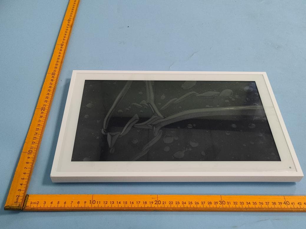 Snugee Family Calendar - FCC ID 2BTCY-CAL150 - NEXURA INNOVATION PTE. LTD.