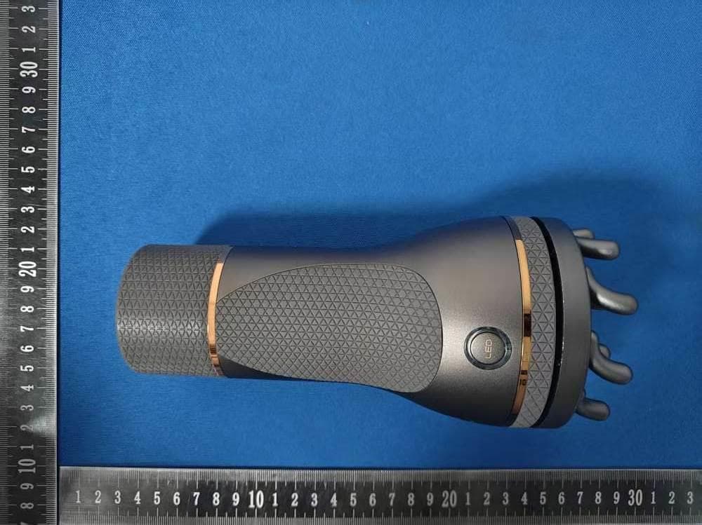 The Nexcia Massage Device - FCC ID 2BTJ6-NEXCIA-100 - Ashley Black Inc.