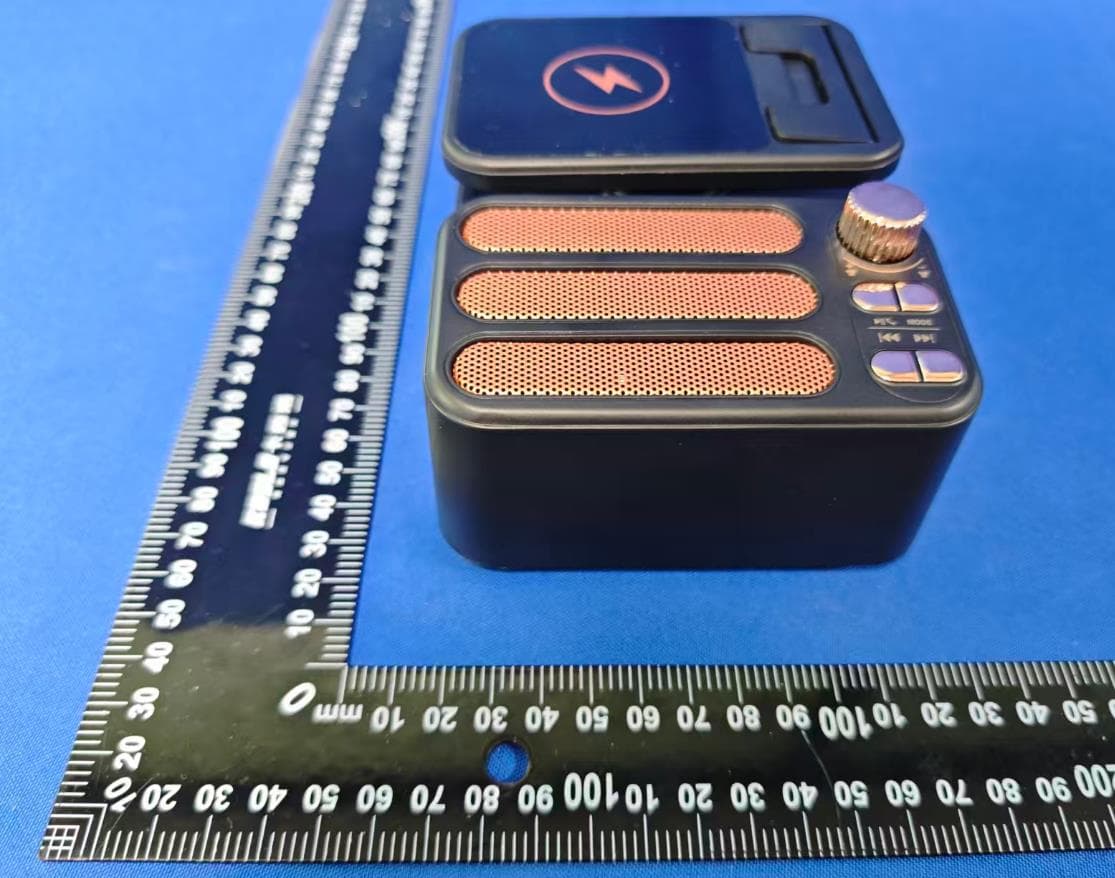 A phone stand with wireless charging - FCC ID 2BTJK-F115 - Dongguan City JuPinMeisheng Electronic Technology Co., Ltd. (4)