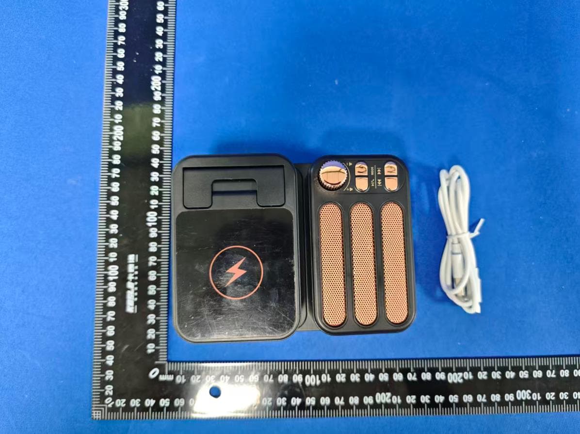 A phone stand with wireless charging - FCC ID 2BTJK-F115 - Dongguan City JuPinMeisheng Electronic Technology Co., Ltd. (3)