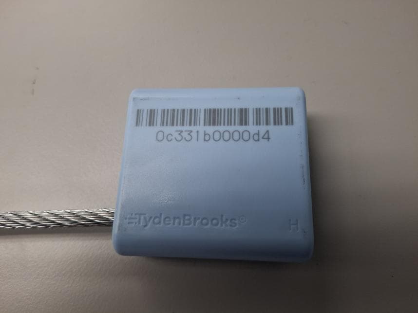 High Security Seal - FCC ID 2BU3D-BLES-2L-12 - E.J. Brooks Company