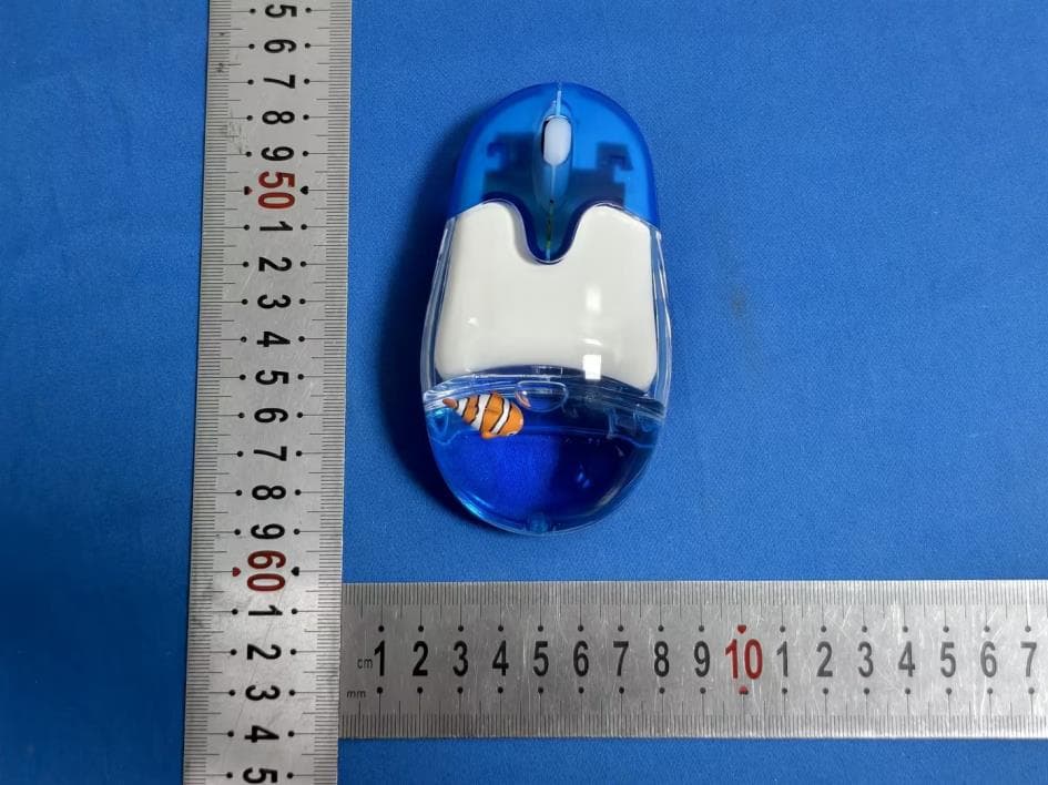 Wireless mouse - FCC ID 2BU6S-FAM1 - Frutiger Aero LLC (2)