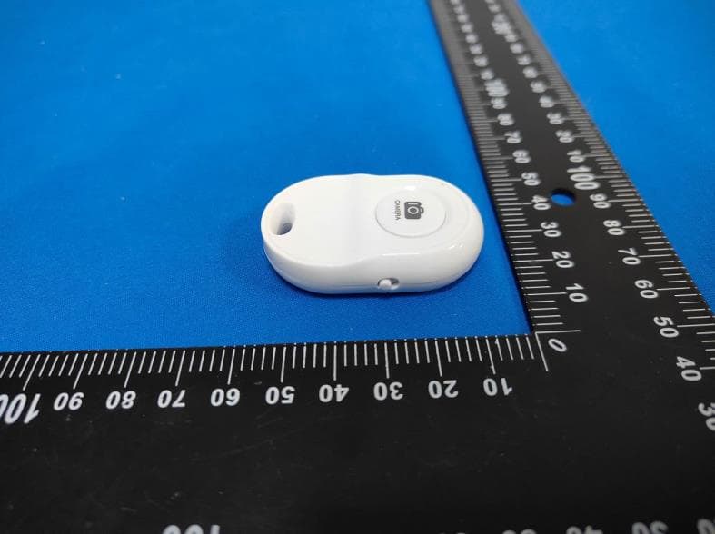 Bluetooth remote shutter - FCC ID 2BUD4-LC08 - Henan Ligan Qicheyongpin Youxiangongsi (5)