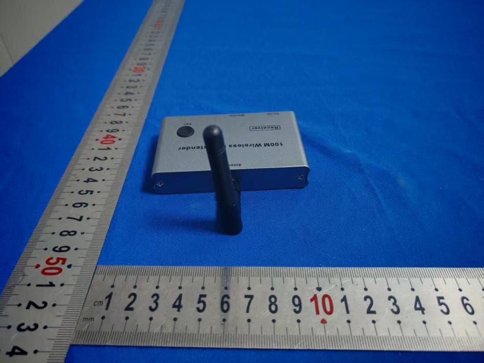 100M Wireless HD Extender - FCC ID 2BUGWWX001 - SHENZHEN OTIME TECHNOLOGY LIMITED (3)