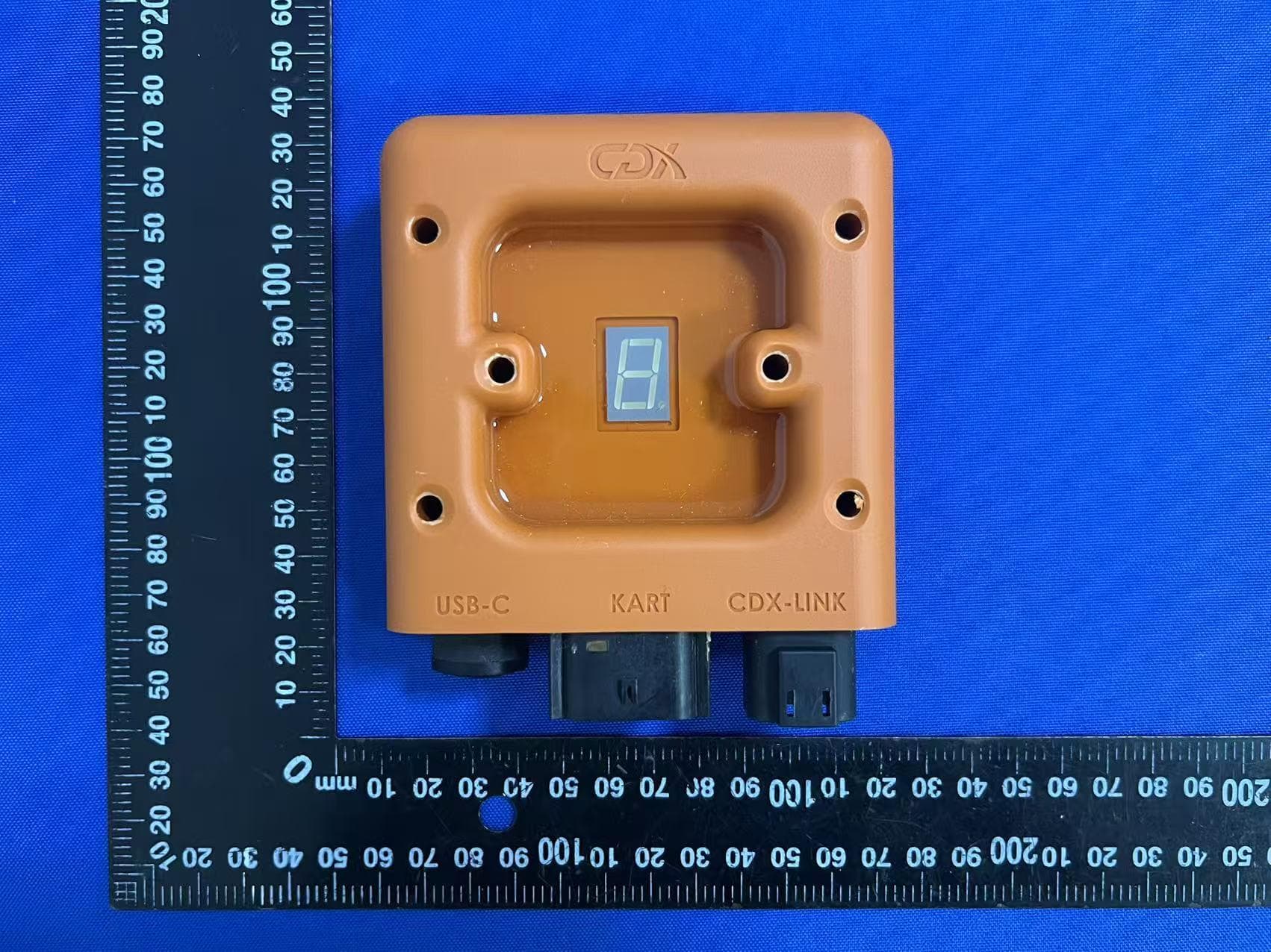The CDX EV Controller is an electronic control unit designed to manage and limit the maximum speed of an alectric go-kart. - FCC ID 2BUQO-CDX-EVRC2301 - CDX Technology Europe B.V. (3)
