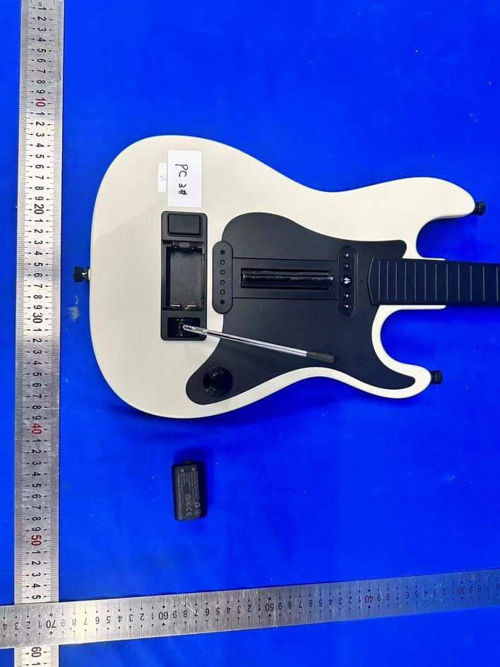 GUITAR CONTROLLER - FCC ID 2BVX9RO26KM - RedOctane Games (2)