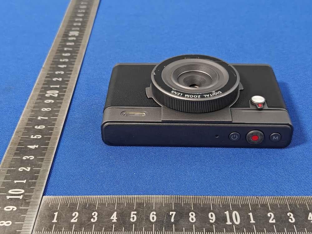 Digital Still Camera - FCC ID 2BXAT-CDFH - Shenzhen Corecam technology Development Limited (4)