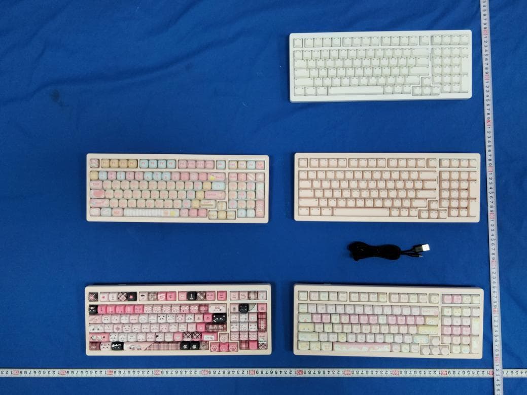 Wireless three-mode mechanical keyboard - FCC ID 2BXH5-M99 - Dongguan Jianjiang E-commerce Co., Ltd.