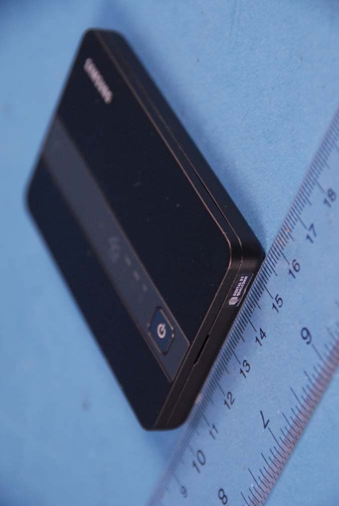 Portable Wireless Router with Multi-band CDMA/LTE and WLAN - FCC ID A3LSCHLC11R - Samsung Electronics Co Ltd (2)