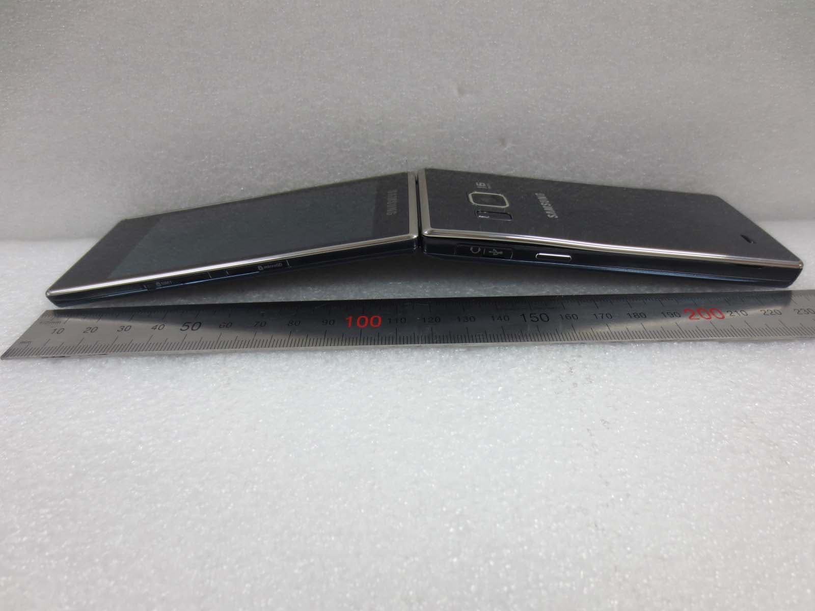 Multi-band GSM/EDGE/WCDMA/LTE phone with BT, WLAN, RFID and ANT+ - FCC ID A3LSMG9198 - Samsung Electronics Co Ltd (1)