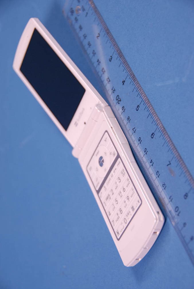 PCS GSM Phone with Bluetooth and RFID - FCC ID A98-MQJ3588 - NEC Corporation of America (1)