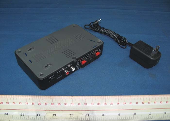 2.4GHz Digital Wireless Rear Speaker Kit - Transmitter - FCC ID AAO1500044T - RadioShack Corporation (3)