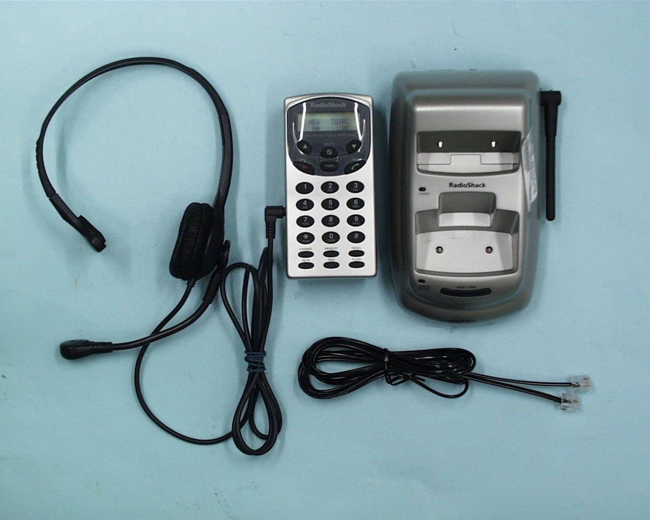 40 Channel Analog Cordless Headset Phone - FCC ID AAO4302101 - RadioShack Corporation