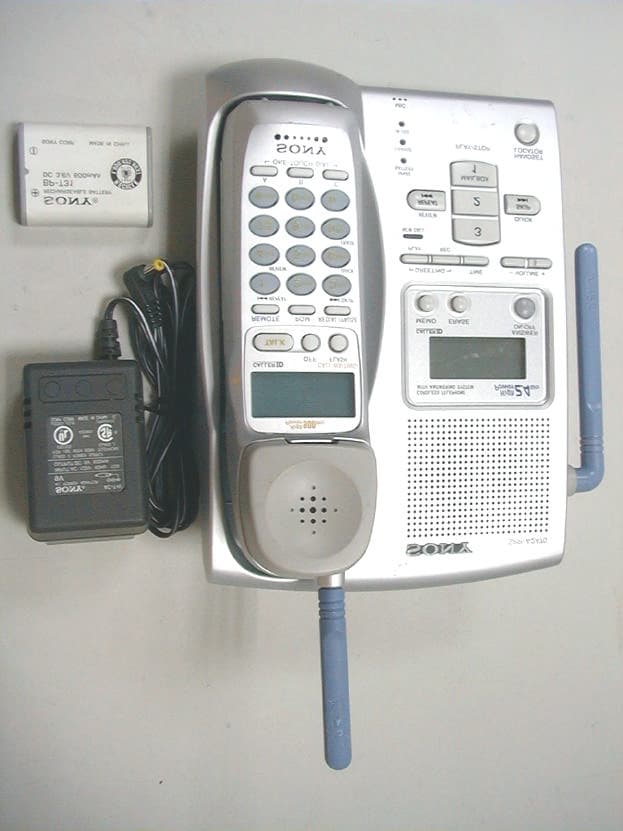 Cordless Telephone With Answering System - FCC ID AK8SPPA2470 - Sony Group Corporation