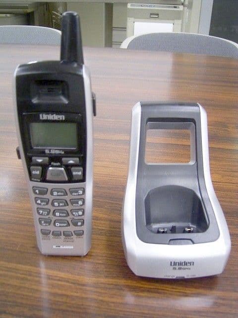 CORDLESS TELEPHONE- REMOTE UNIT - FCC ID AMWUC033R - Uniden America Corporation