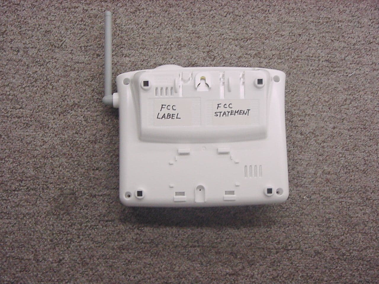 Cordless Telephone - Base - FCC ID AMWUP003 - Uniden America Corporation