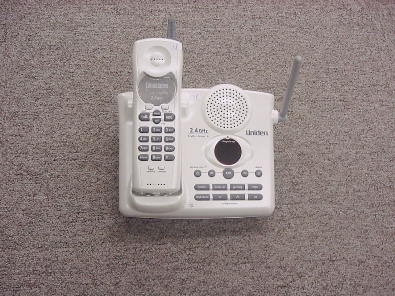 Cordless Telephone - Handset - FCC ID AMWUP003R - Uniden America Corporation