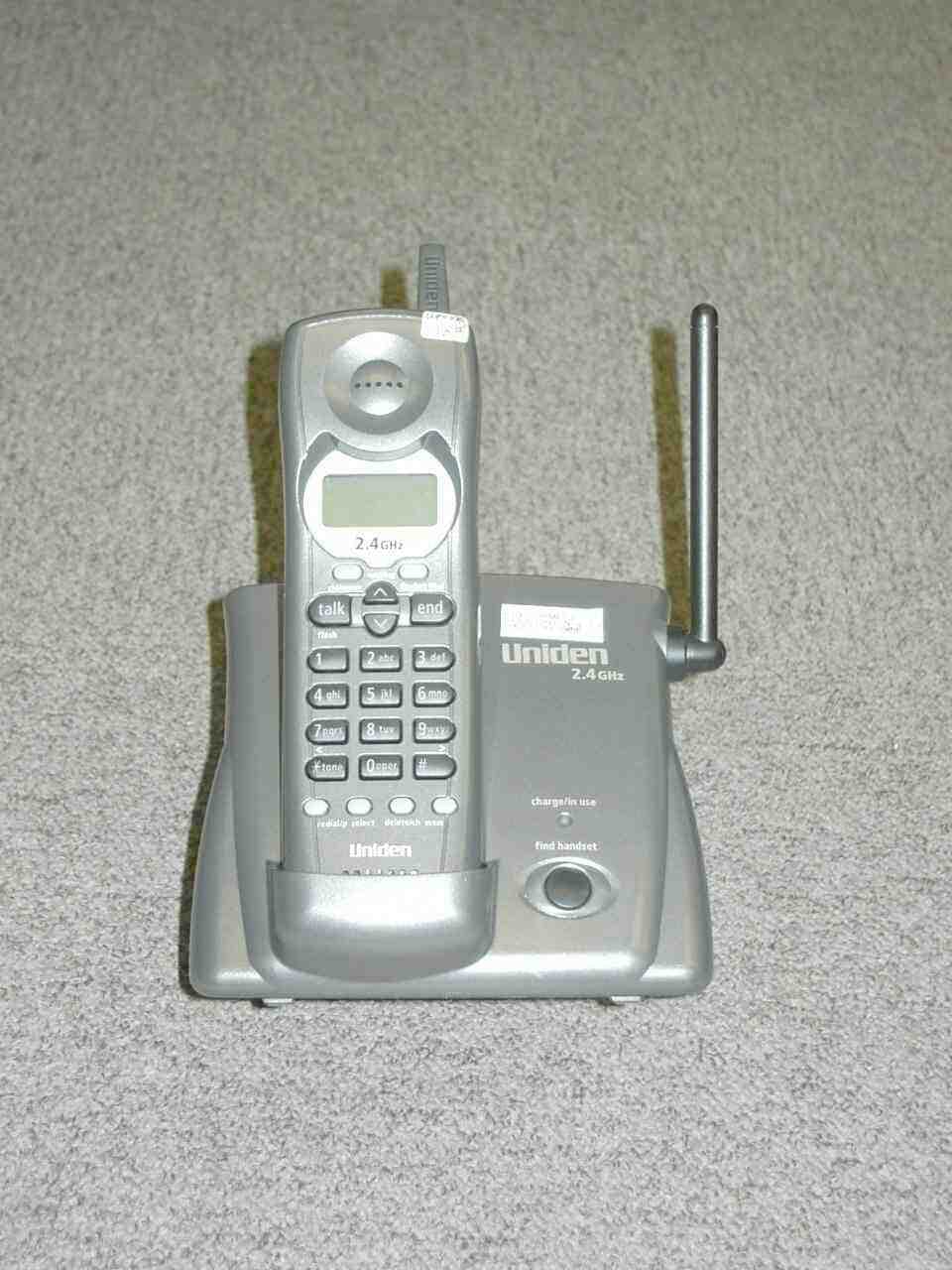 Cordless Telephone System - FCC ID AMWUP009R - Uniden America Corporation