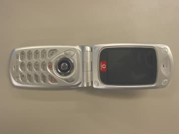 1900MHz GSM/GPRS Cellular Phone - FCC ID APYHRO00030 - Sharp Corporation